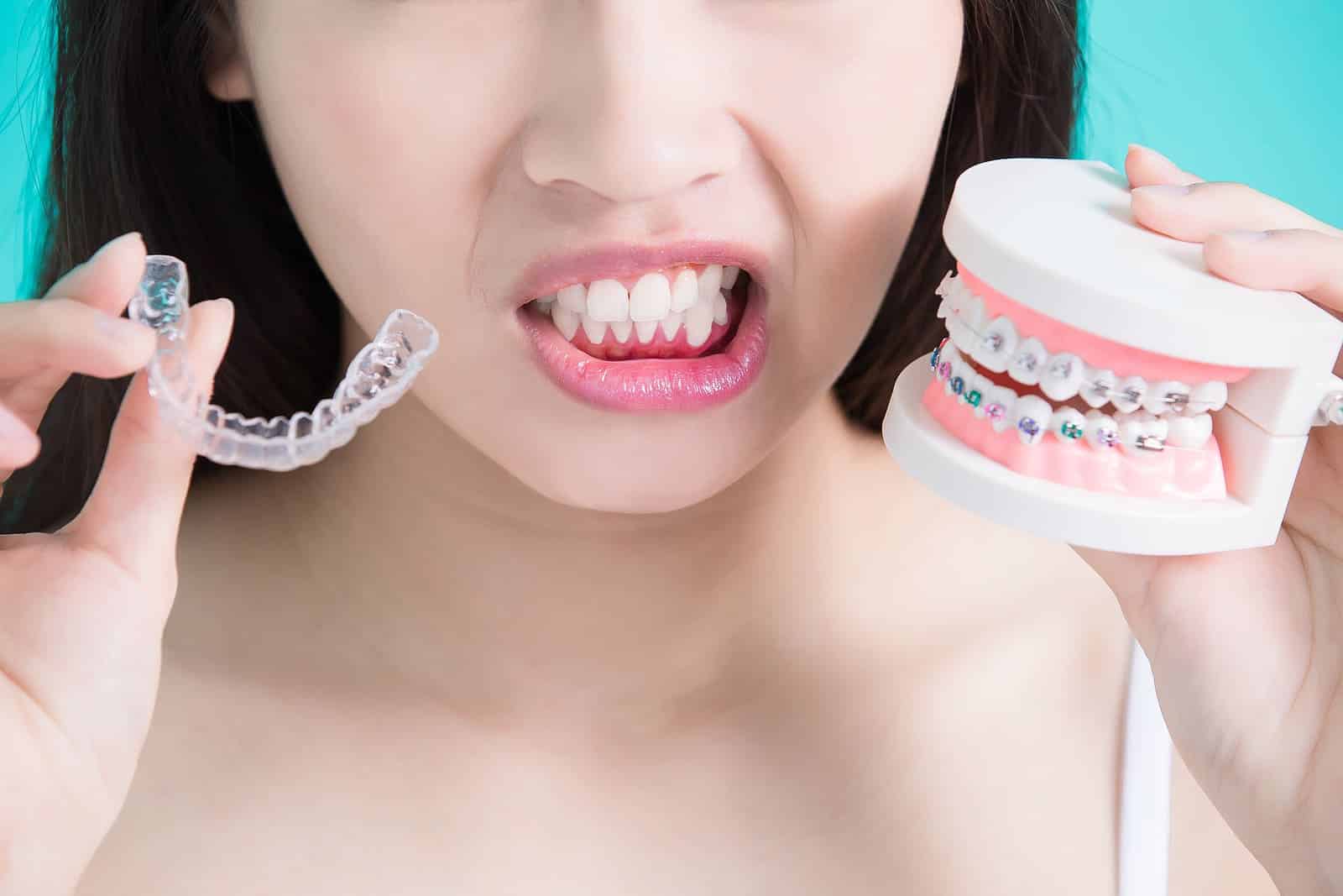 Adult comparing Invisalign and braces in Ukiah CA